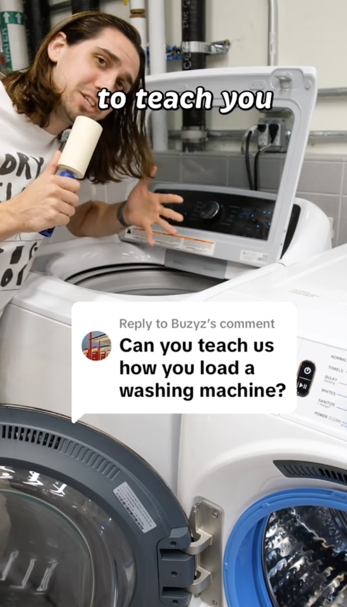 man with a laundry machine